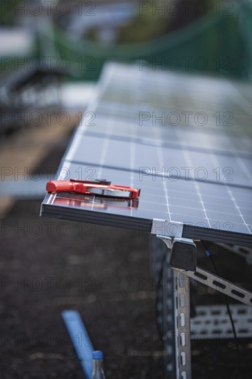 Solar modules and tools on a rack, detailed view of an installation, new Park and Ride Calw