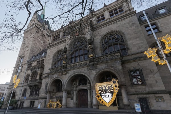 Duisburg town hall in early Renaissance style, entrance portal with Christmas decoration and city