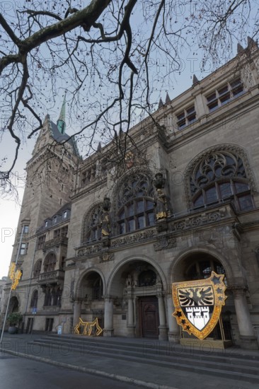 Duisburg town hall in early Renaissance style, entrance portal with Christmas decoration and city