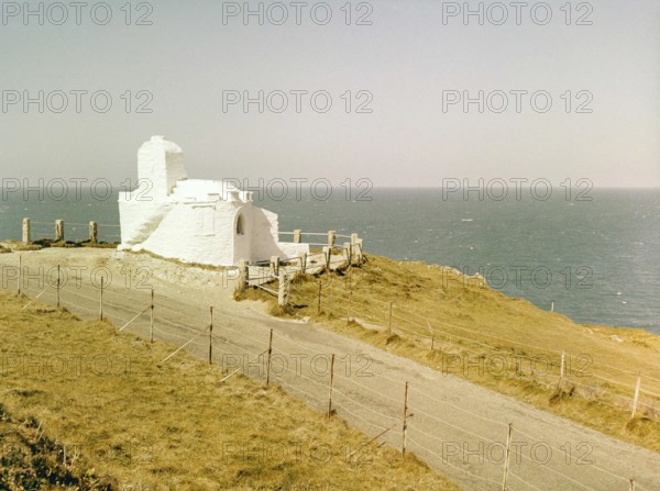 Historic listed building, Huer's Hut, a hermitage and lighthouse, Towan Headland, Newquay,