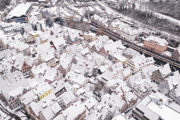 Snowy old town with half-timbered houses from a bird's eye view, winter atmosphere, Calw, Black