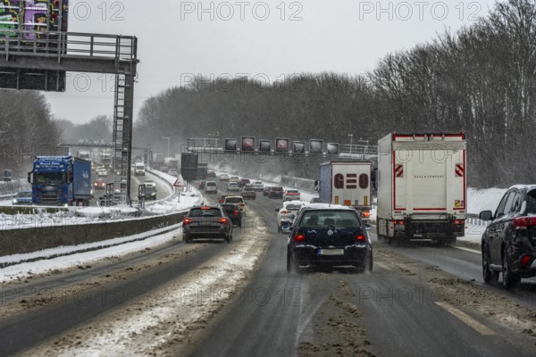 The onset of winter in North Rhine-Westphalia, heavy snowfall, driving on the A3 motorway near