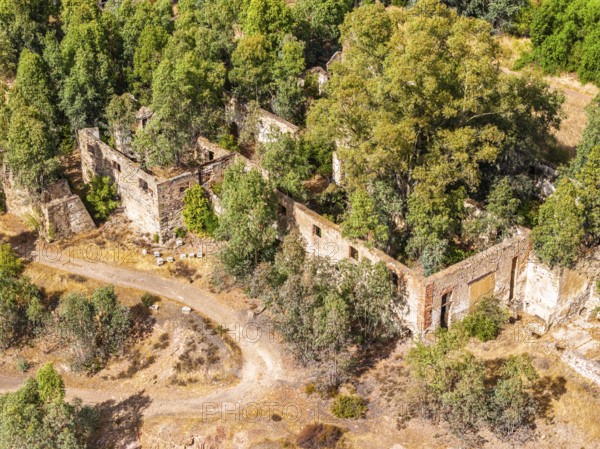 Ruins of former workshop halls, Mina de Sao Domingos, historic copper open-pit mine, aerial view,