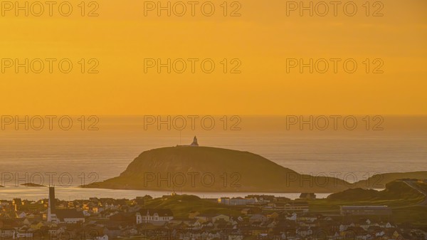 View of the city of Vardø from Mount Domen in the background the island of Hornoya with the