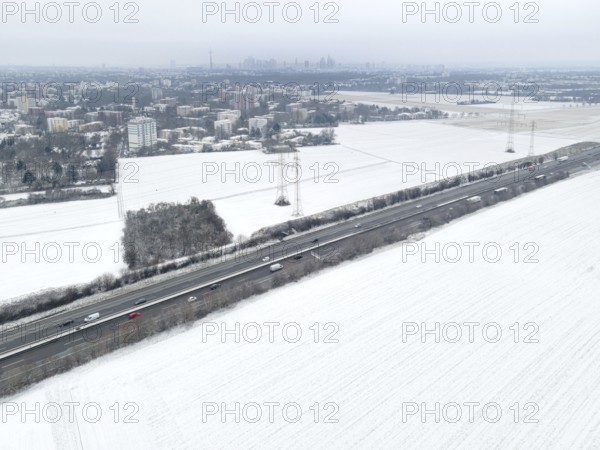 The fields in the north-west of Frankfurt am Main covered in snow. (Aerial view with a drone) On