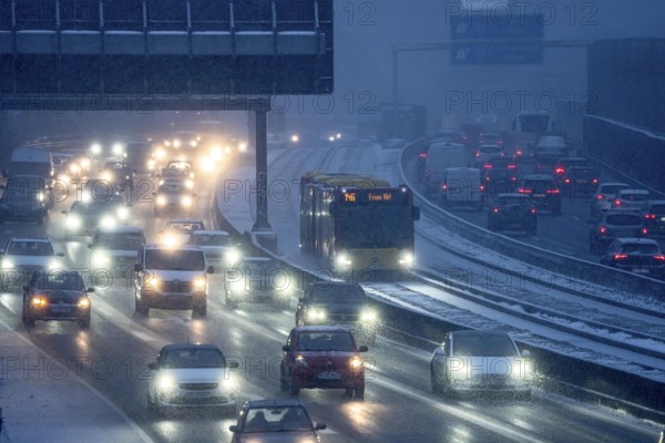 Winter weather, motorway traffic, A40 motorway, Ruhrschnellweg, in Essen, at the Essen-East
