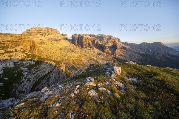 View of rocky mountain peaks of the Brenta Mountains at sunset, Alpenglühen, mountain landscape on