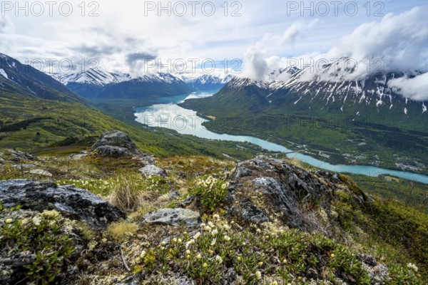 View of snowy mountains and turquoise lake Kenai Lake, Slaughter Ridge Trail, Cooper Landing, Kenai