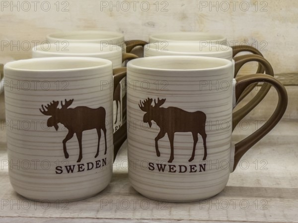 Swedish souvenir: mugs with moose picture in Småland Moose park in Markaryd, Småland County,