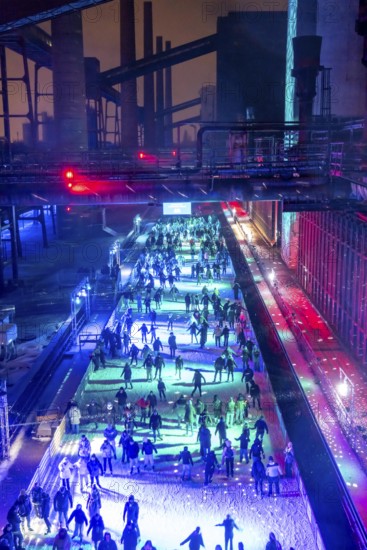 Ice rink at the Zollverein coking plant, ice skating with music and many lighting effects, Essen,
