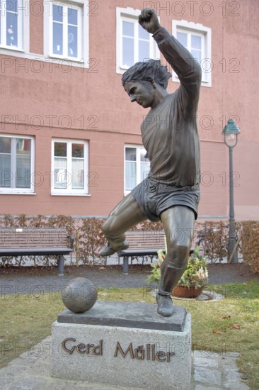 Memorial to soccer player Gerd Müller, German national team player, soccer legend, bronze