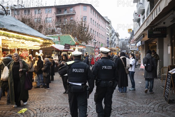 December 22, 2025, police officers showing presence and ensuring security at the Christmas market