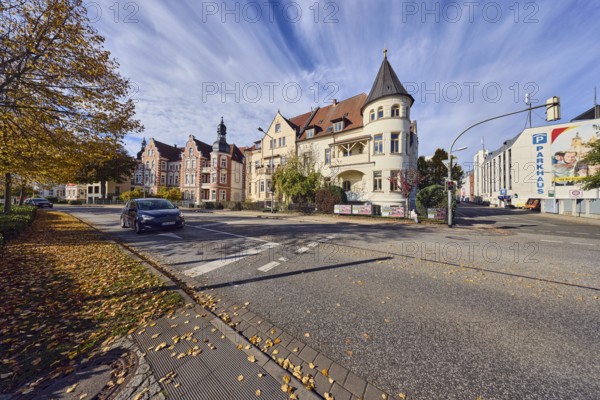 Historic residential buildings, turrets, balcony, façade with windows, Contipark parking garage Am