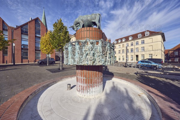 Pastor sin Kauh fountain, bronze sculpture, sculptor Stephan Horota, trees with autumn leaves,