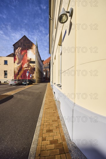 Residential buildings, apartment buildings, modern façade painting, brick sidewalk, asphalt road,