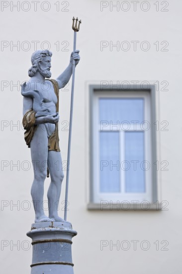 Fountain and Neptune with trident sculpture, Roman water god, Neptune fountain, market square,