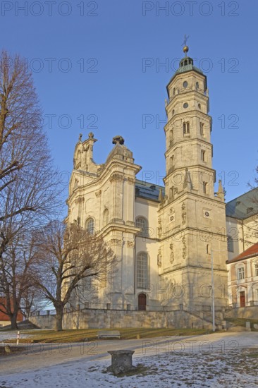 Late Baroque monastery church in winter with snow, courtyard, Benedictine monastery, Neresheim,