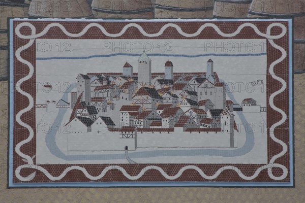 Historical wall by artist group Kollektiv K 2020, wall mosaic with historic city fire, cityscape