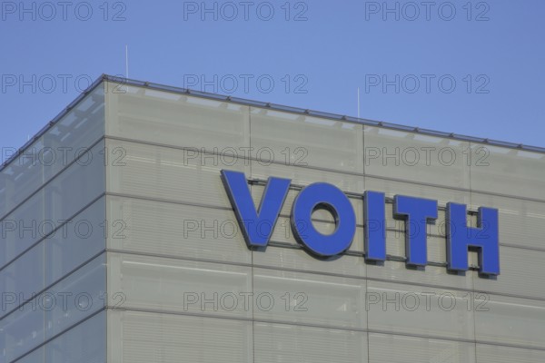 Voith company emblem with blue inscription, company, industry, steel production, mechanical
