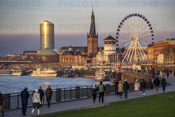 Rhine promenade in Düsseldorf, Ferris wheel, old castle tower, St. Lambert Basilica, old town, ERGO