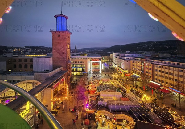 View of the town hall tower with the Christmas market from a Ferris wheel gondola, Hagen, Ruhr