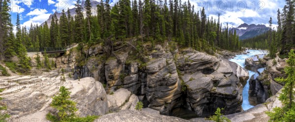 Mistaya canyon, showcasing the stunning artistry of erosion on rock formations in banff national