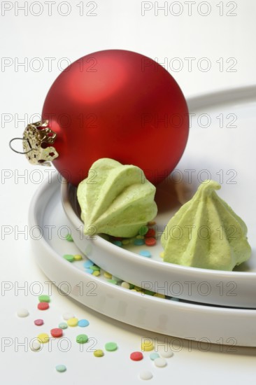 Meringue on plate, Christmas cookies, meringue and Christmas tree ball