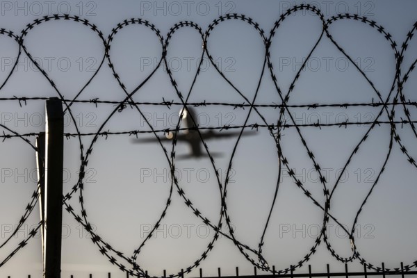 Symbolic picture security at the airport, outer fence at Düsseldorf International Airport, steel