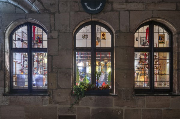View through the windows of the historic restaurant, Albercht Dürer Stuben, in the old town with