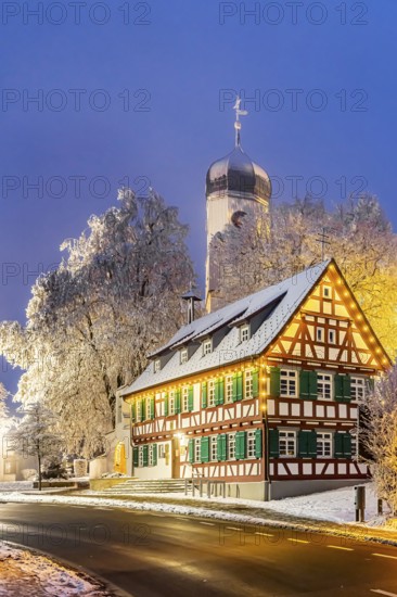 St. Stephen's Church Westerheim in winter with Christmas tree. hoarfrost. Westerheim, Alb-Danube