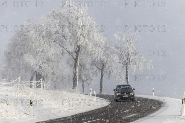 Winter in the Swabian Jura. Country road with snowy landscape near Westerheim, Alb-Donau-Kreis,
