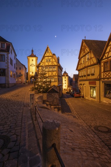 December 25, 2025: Christmastime at Plönlein — Rothenburg ob der Tauber, Bavaria, Germany. Festive