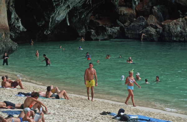 People bathing and sunbathing on Pranang Cave beach, two years in front of the tsunami, Krabi,