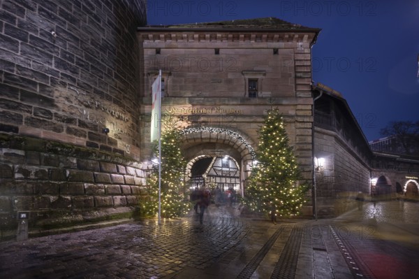 Decorated entrance to the Handwerkerhof during Advent, Königstor, Nuremberg, Middle Franconia,