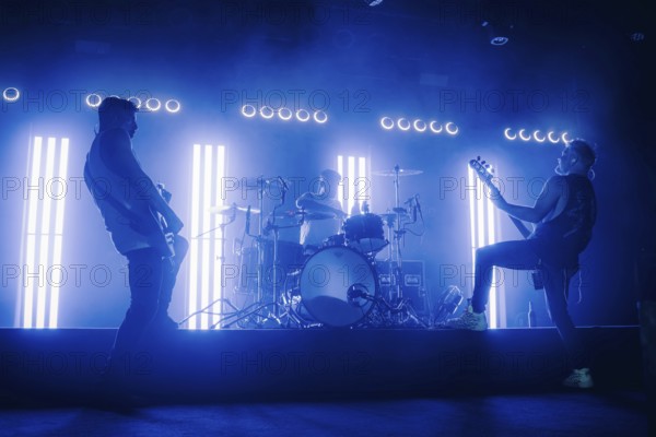 Bass player Chris Wendel, drummer Yuri Cernovolov and guitarist Ramin Tehrani from Engst live on
