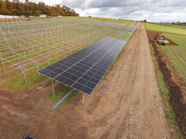 Solar plant construction frames cover large fields, energy transition, construction of PV open