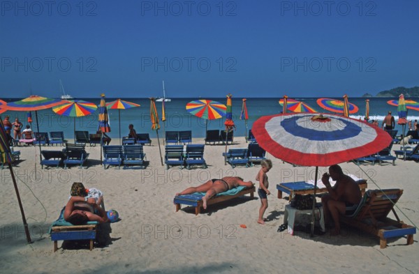 Umbrellas, people, Patong Beach, Ko Phuket, two years in front of the tsunami, Thailand, December