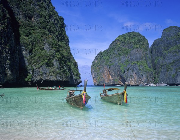 Longtail boats on Maya Bay beach, known from the movie The Beach, one year in front of the tsunami,