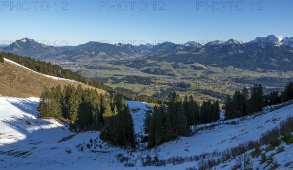 View from the Bolsterlanger Horn of villages in the Illertal and mountains of the Allgäu Alps,