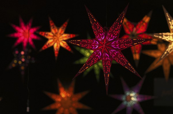 Colorful Christmas stars, sales stand, baroque Christmas market, blue hour, dusk, Ludwigsburg,