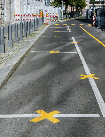 Yellow road marking at construction sites in Berlin, Germany