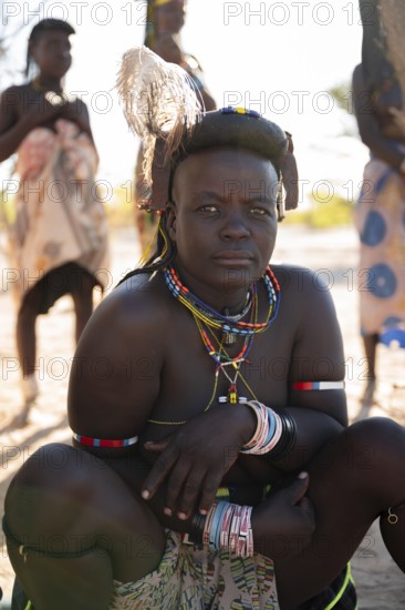 Portrait, brightly decorated woman of the Hakaona tribe, also Havakona or Hakawona, near Opuwo,