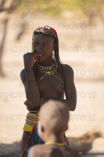 Portrait, brightly decorated girl of the Hakaona tribe, also Havakona or Hakawona, near Opuwo,