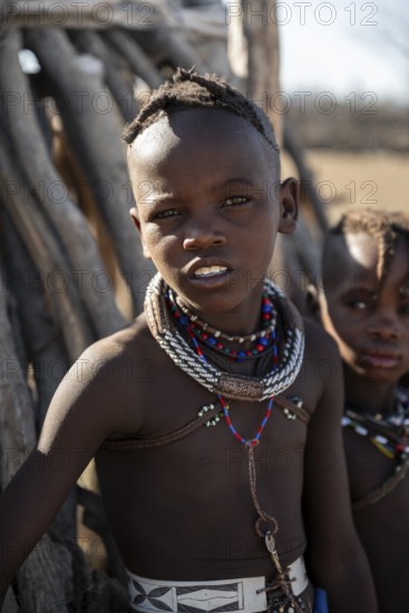 Portrait, Himba boy, traditional Himba village, Kaokoveld, Kunene, Namibia