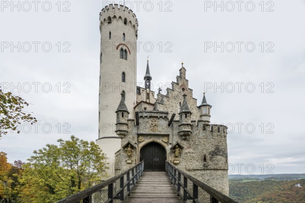 Castle and autumnal forest, Lichtenstein Castle, Honau, Echaz Valley, Swabian Jura,
