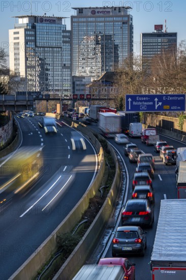 The A40 motorway, Ruhrschnellweg, in Essen, city skyline, Evonik office building, traffic jam in