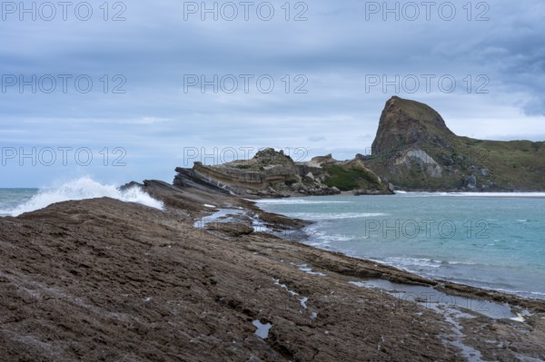Deliverance Cove and Castle Rock, rocks, ocean, surf. Castlepoint, Wairarapa Coast, Wellington