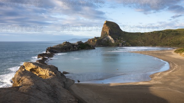 Deliverance Cove and Castle Rock, rocks, ocean, surf, morning. Castlepoint, Wairarapa Coast,