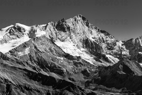 Snowy peak of Weisshorn mountain, black and white photo, Val d'Anniviers, Valais Alps, Canton of