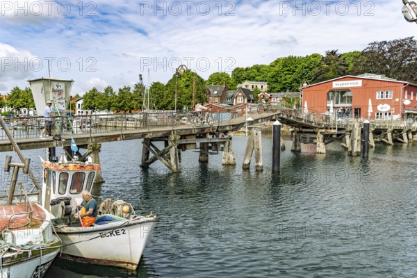 Eckernförde wooden bridge and the Siegfried shipyard at the inland port in Eckernförde,